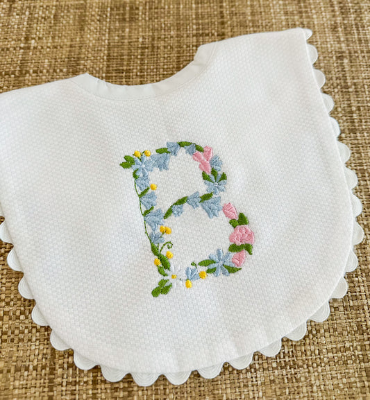 Floral initial bib