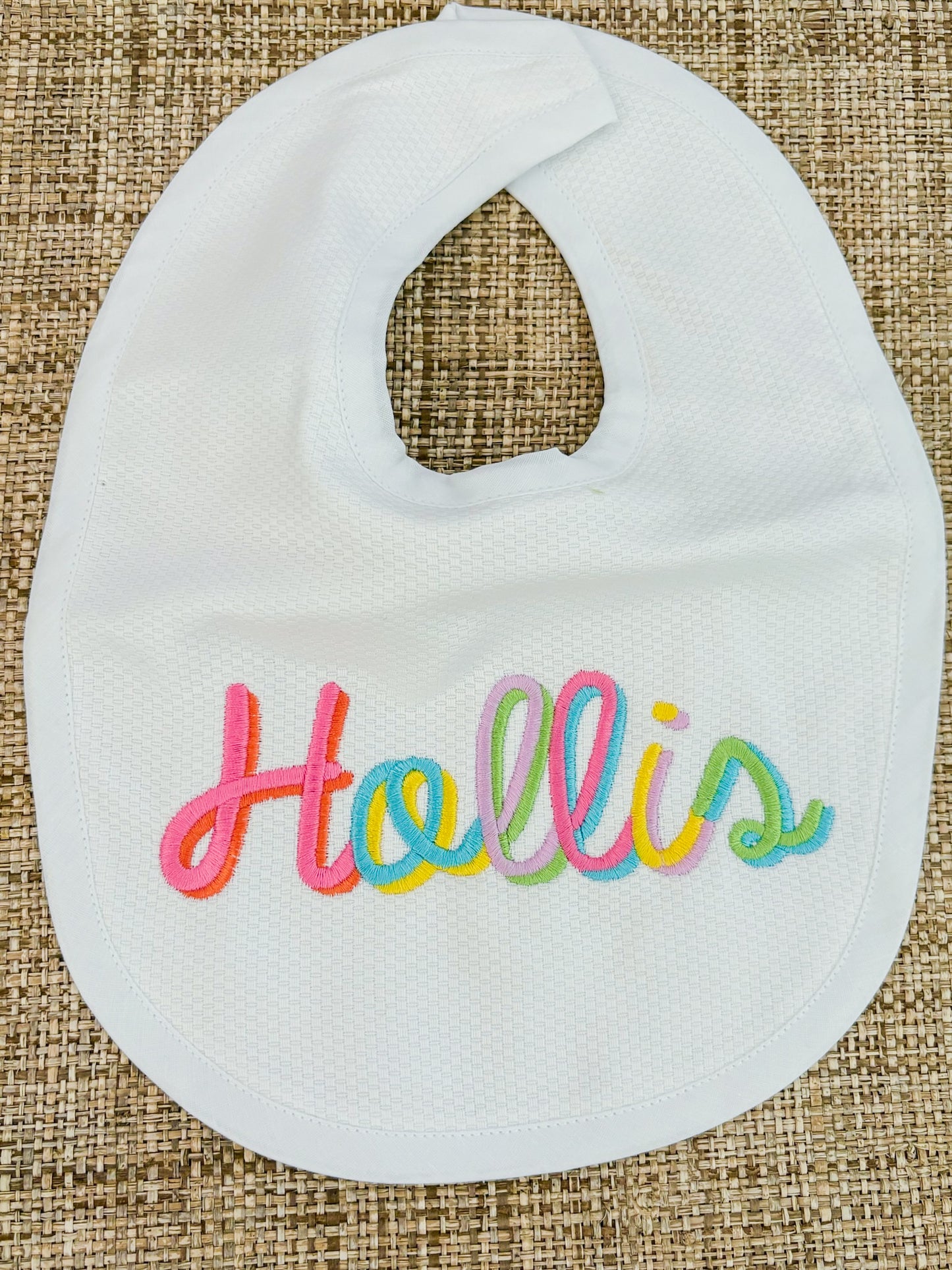 "Hollis" bib